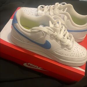 Nike woman’s White and Blue court vision low Sneakers